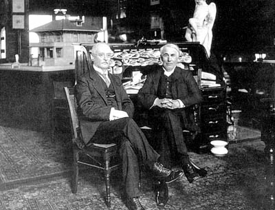 Rudolph Diesel and Thomas Edison exchange ideas