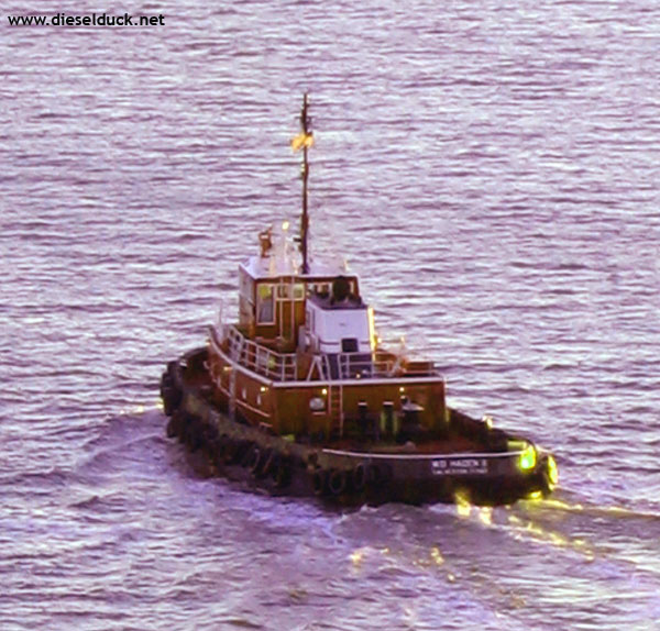A tug heads out to sea from Galveston